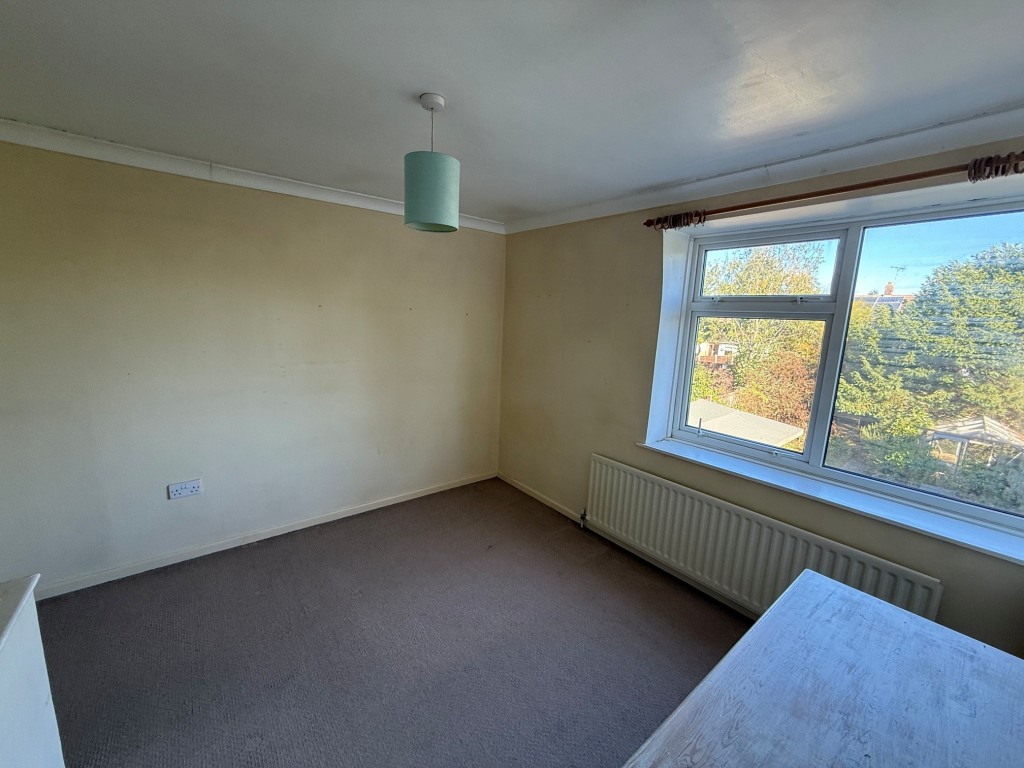 Lot: 164 - TWO-BEDROOM SEMI-DETACHED HOUSE FOR IMPROVEMENT AND REPAIR - Bedroom 2 with window to the rear